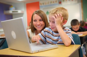 Teacher and student with laptop Teacher and student with laptop