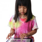 Child with iPad